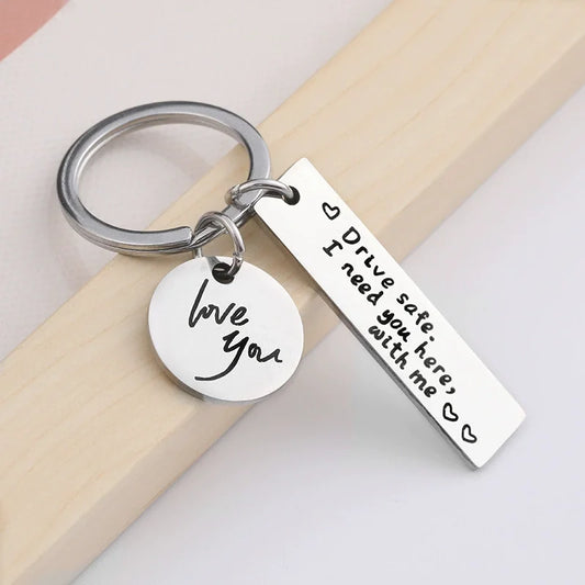 "Drive Safe, I Need You Here With Me" Metal Keychain – Romantic Gift for Men & Women
