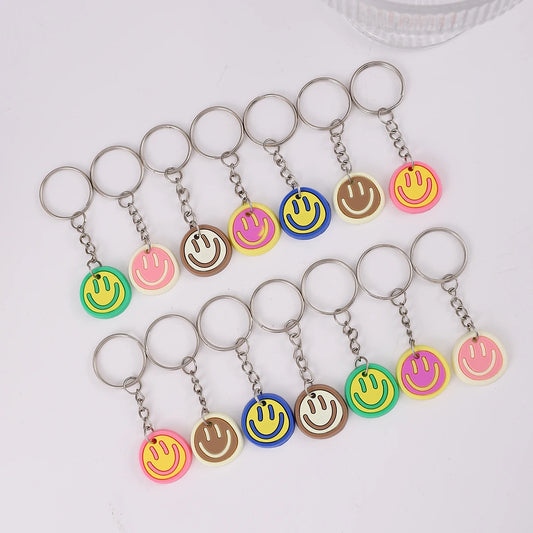 14pcs Cartoon Smile Face Keychain Set – Cute PVC Charms for Bags, Keys & Party Favors